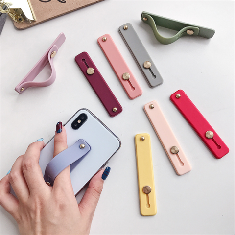 Colorido muñequera banda de mano agarre de dedo soporte de teléfono móvil Push Pull soporte conector de teléfono Universal para Iphone Xiaomi ► Foto 1/6
