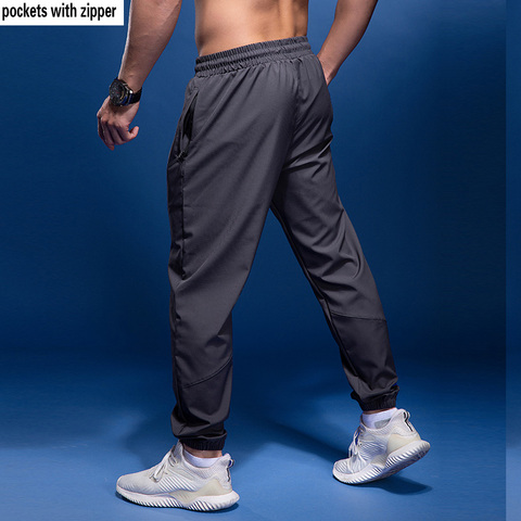 BINTUOSHI-Pantalones deportivos con bolsillos y cremallera para hombre, Pantalones de entrenamiento de fútbol para correr, Fitness, 1 unidad ► Foto 1/6