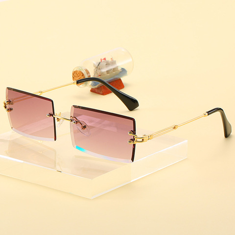 Gafas de sol sin montura para hombre y mujer, anteojos de sol femeninos a la moda, pequeños y rectangulares, estilo veraniego, de viaje, color marrón dorado, con UV400 ► Foto 1/6