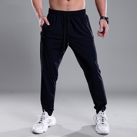 Pantalones deportivos transpirables para hombre, pantalón para correr con bolsillos y cremallera, para entrenamiento, para correr ► Foto 1/6