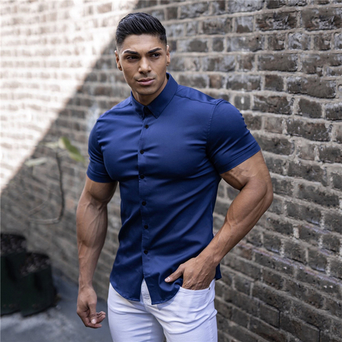 De los hombres de moda Casual pantalón corto de manga de camisa superfino para hombre de negocios sociales vestido camisa de los hombres de la marca de Fitness ropa deportiva ► Foto 1/6