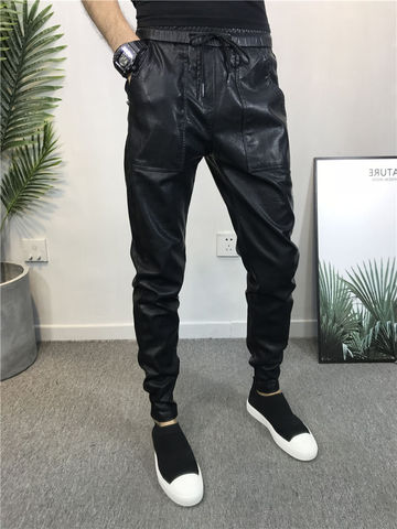 Streetwear Hip hop pantalones hombres flacos pantalones de piel de imitación de talla grande de pantalones Harem pantalón negro ► Foto 1/6