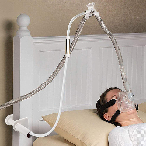 Soporte ajustable para manguera CPAP, colgador plegable para prevenir fugas de tubo y enredos, mejora el sueño ► Foto 1/6