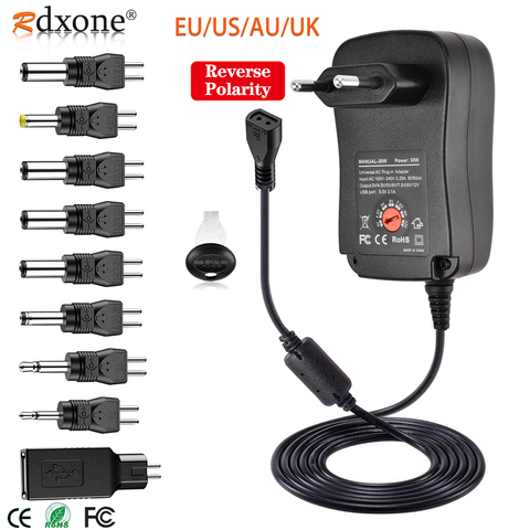 Adaptador Universal de CA de 30W, multivoltaje CC de fuente de alimentación, polaridad Reversible, con 9 Uds. De puntas de adaptador, Compatible con 3V a 12V ► Foto 1/6