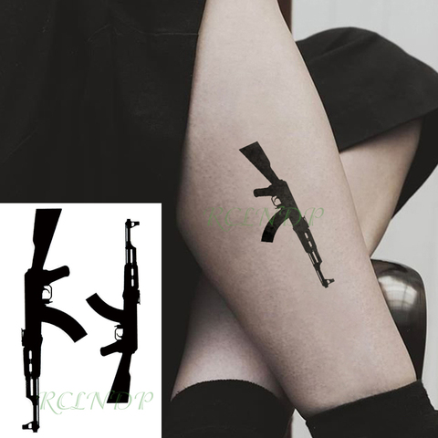 Tatuaje temporal a prueba de agua pegatina negra pistola tatuaje flash tatuaje tatuajes falsos para hombres y mujeres ► Foto 1/6