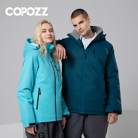 Traje de esquí COPOZZ montaña impermeable Snowboard cálido chaqueta de esquí y pantalones conjunto de esquí hombres mujeres invierno Mujer al aire libre hombre nieve trajes ► Foto 1/6