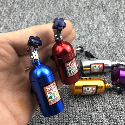 De moda de ambientador de aire con Perfume para coche olor NOS botella en forma de botella de estilo de coche salida de aire de ventilación Clips para Perfume accesorios de Auto ► Foto 1/6