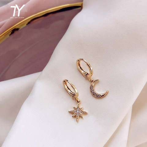 Boucles d'oreilles asymétriques étoile lune boucles d'oreilles sens avancé tempérament femme minorité boucles d'oreilles nouvel an tendance net boucles d'oreilles rouges ► Photo 1/6