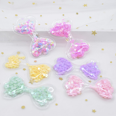 12 pièces 62*36mm nœud papillon Transparent en plastique remplissage Sequin Appliques pour bricolage artisanat chapeau patchs chapeaux pinces à cheveux décor L01 ► Photo 1/4