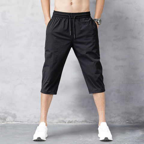 Short homme été culotte 2022 mince Nylon 3/4 longueur pantalon homme Bermuda Board séchage rapide plage noir short Long homme ► Photo 1/6