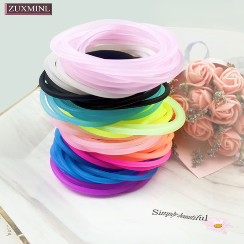 100 pièces femmes coloré  cheveux cravates  Silicone élastique  enfant fille bandes de caoutchouc  pour porte-queue de cheval filles decoration cheveux bandeaux gomme enfants bandeau accessoires ► Photo 1/6