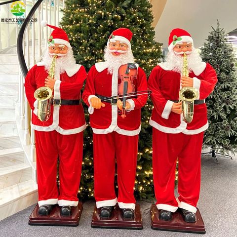 Le grand père noël joue du saxophone, l'induction activée par la voix souffle automatiquement, décoration de noël dansant le père noël ► Photo 1/6