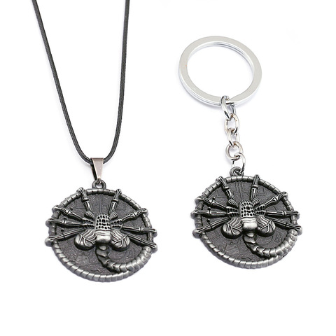 Porte-clés en métal pour femmes, film en vogue, Alien v Predator, rond, motif face hugger, collier pour femmes, sac de voiture, accessoire ► Photo 1/6