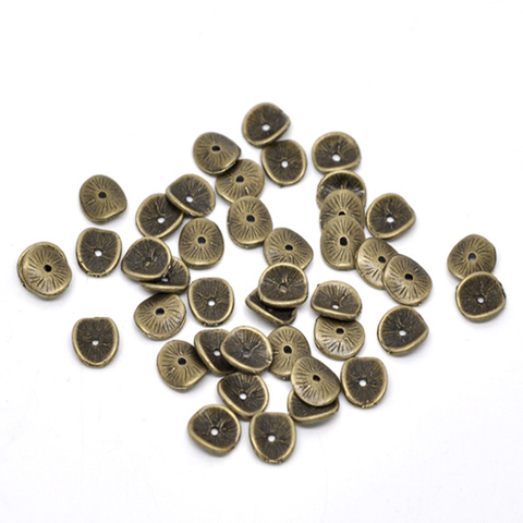 Disque de perles d'espacement ondulées en alliage à base de Zinc, Bronze Antique, trou d'environ 10mm x 9mm, trou d'environ 1mm pour la bijouterie, 50/100/200 pièces ► Photo 1/6