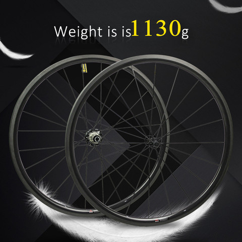 1130g seulement 700C roues de vélo de route en Fiber de carbone roue de vélo tubulaire ou pneu moyeu de traction droite et 4.3g a parlé pour Clmbing ► Photo 1/5