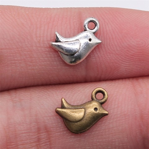 WYSIWYG 20 pièces 11x8mm minuscule oiseau charme mignon oiseau breloques pour la fabrication de bijoux Antique argent couleur oiseau breloques ► Photo 1/3