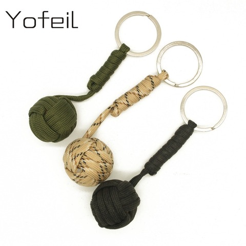 2 pcs/lot D'urgence de Sécurité protection Noir Singe Poing Bois Balle Auto Défense parachute Lanière Survie Camping key chaîne ► Photo 1/5