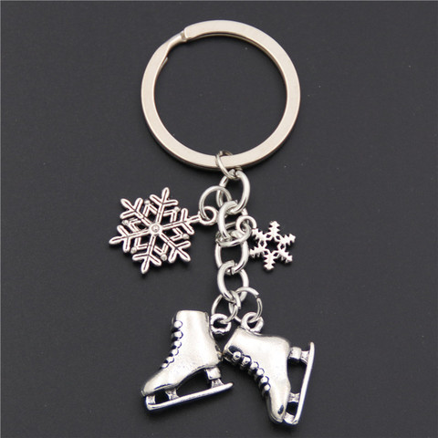 Porte-clé avec pendentif flocon de neige et patins à glace, couleur argent, bijou pour cadeau d'hiver, 1 pièce ► Photo 1/3