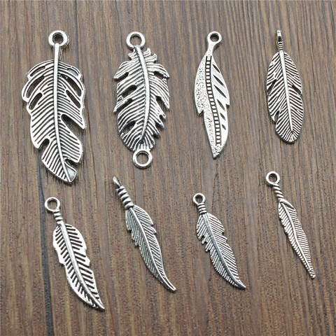 20 pcs / lot breloques en plumes pendentifs en plumes fabrication de bijoux breloques en plumes pour la fabrication de Bracelet couleur argent Antique ► Photo 1/2