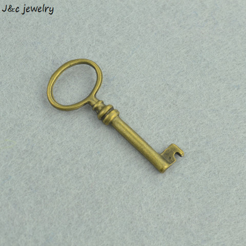En gros 10 pièces breloques en métal Antique Bronze clé pendentif à breloques fabrication de bijoux Bracelet collier bricolage 41*17mm O258 ► Photo 1/1