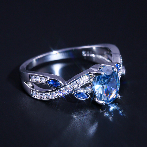 Huitan Cirrus torsion conception d'enroulement avec des feuilles mignonnes femmes anneaux avec brillant bleu ciel cubique Zircon pierre femme bijoux anneau ► Photo 1/6
