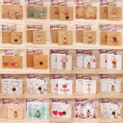 24 conceptions mode bijoux affichage collier breloques paquet carte 50pc kraft capteur de rêves/marbre style pendentif affichage étiquette carte ► Photo 1/6