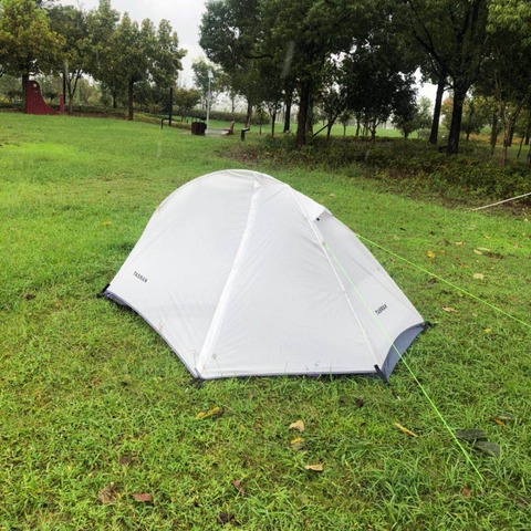 La tente de randonnée ultralégère Nemo Hornet est livrée avec des chevilles en aluminium, une corde réfléchissante et un sac de transport, une tente de Camping CZX-288 ultra-légère ► Photo 1/6
