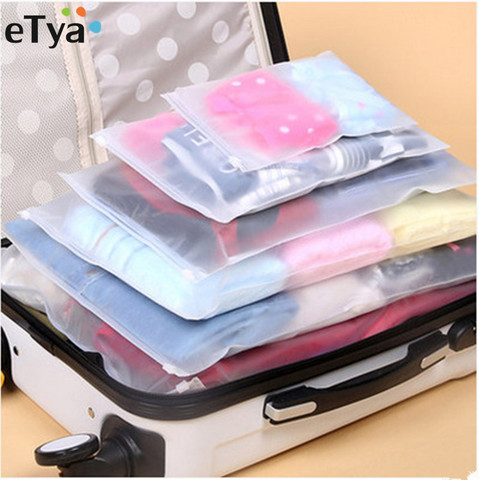 ETya 5 pièces/ensemble femmes hommes voyage bagages emballage Cube organisateur sacs PVC sac cosmétique étanche ► Photo 1/6