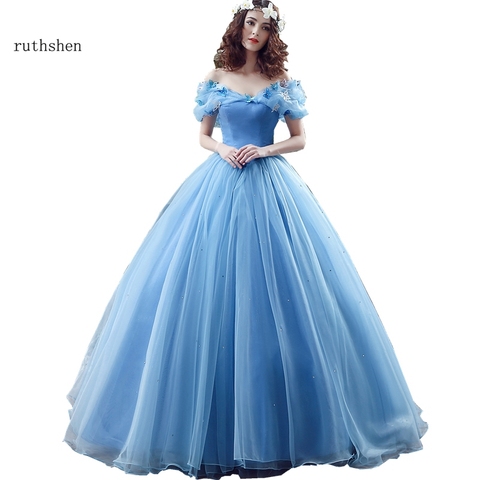 Robe De fée bleu clair avec épaules dénudées et papillon en