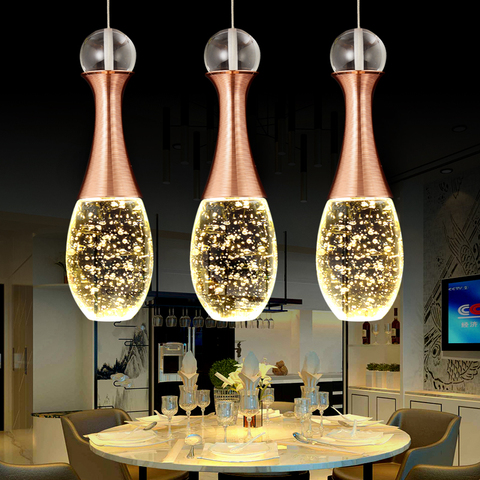 Plafonnier LED en cristal au design minimaliste moderne, composé d'une tête unique et de trois bulles lumineuses, idéal pour une salle à manger ou un bar ► Photo 1/6