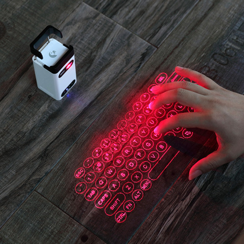 Clavier sans fil Bluetooth Portable à Projection Laser, écran virtuel tactile infrarouge, pour téléphone et ordinateur Portable ► Photo 1/1