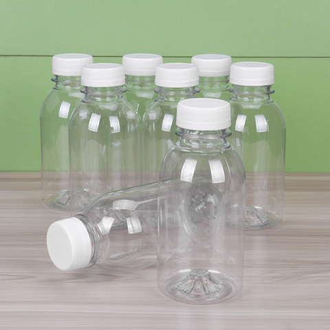 Bouteilles vides en plastique transparentes de récipients de boisson gazeuse avec des couvercles 300/350/400ml bouteilles Orange de Smoothies de lait de jus de citron de pomme ► Photo 1/6