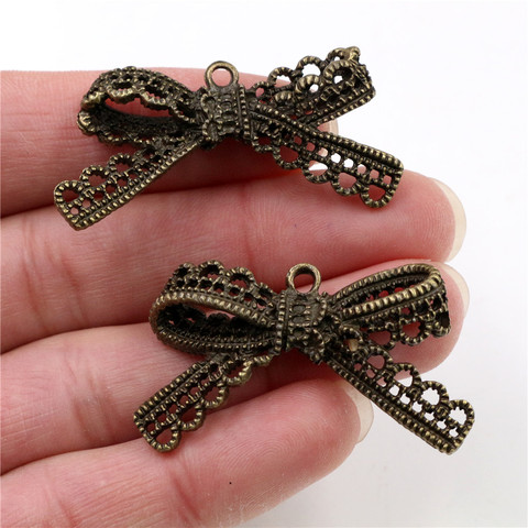 Nœud papillon plaqué Bronze Antique, breloques faites à la main, pendentif, bricolage pour bracelet, 44x23mm, 4 pièces, necklace-Q2-31 ► Photo 1/2