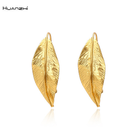 HUANZHI 2022 rétro doré feuille de métal boucles d'oreilles géométrique irrégulière plante boucle d'oreille pour les femmes filles fête voyage bijoux ► Photo 1/6