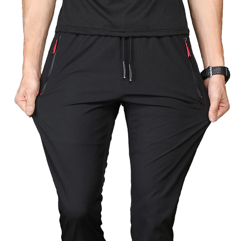 Nouveaux hommes pantalons décontractés automne printemps mâle concepteur solide mince Stretch pantalon hommes pantalons de survêtement en vrac marque vêtements M ~ 5XL HGK01 ► Photo 1/6