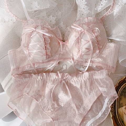 Femmes couleur unie broderie dentelle lingerie et culotte ensemble ébouriffé croix ruban sexy mince moule tasse bras sans anneau en acier bralette ► Photo 1/6