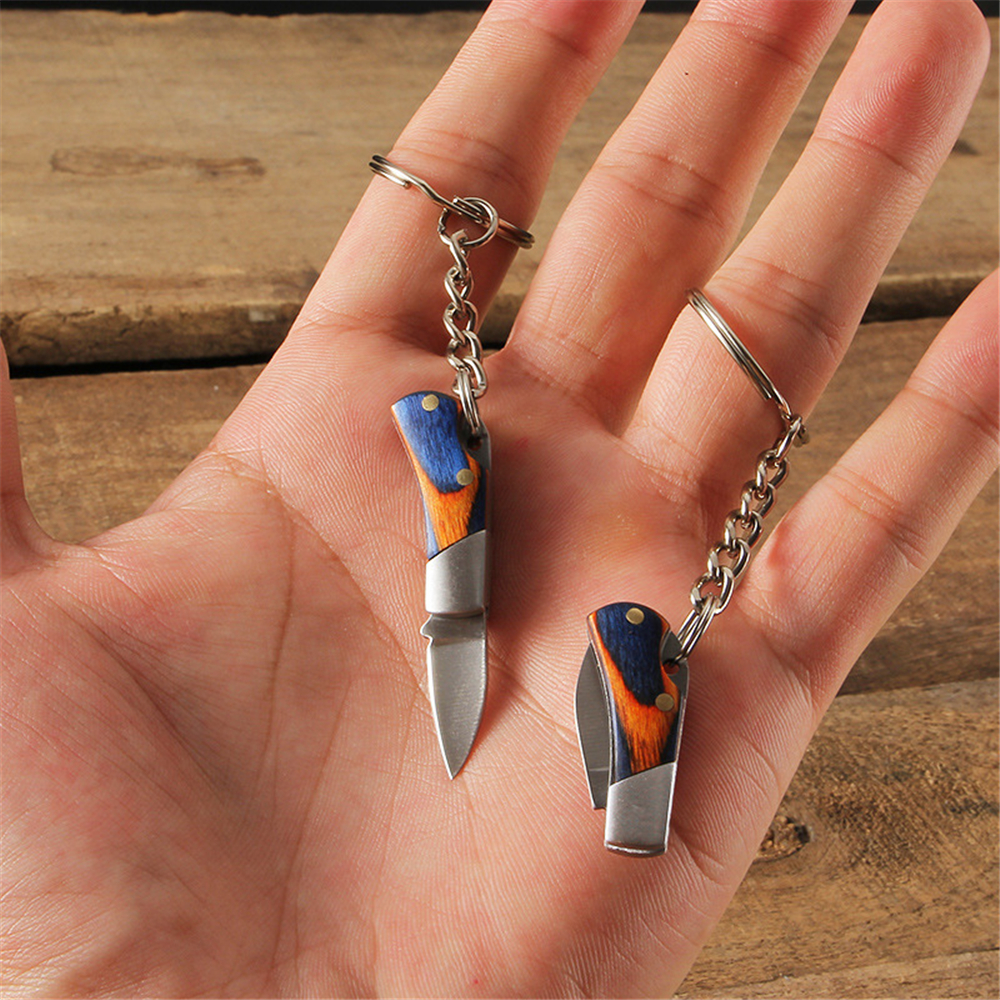 Mini porte-clés créatif à glissière couteau Portable survie en plein air outil 
