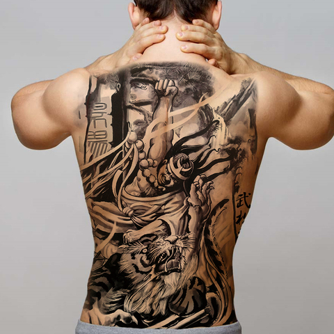 Татуировка дракона на руке мужчины: символ силы и мужества