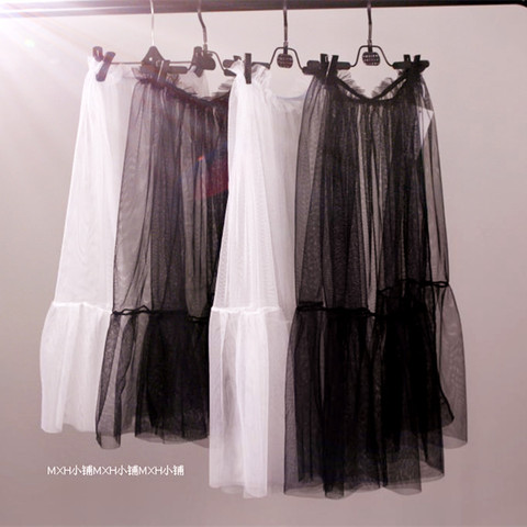 Прозрачная сетчатая юбка средней длины с полупрозрачной сеткой в стиле пэчворк ► Фото 1/3