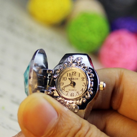 Модные женские часы с кольцом эллиптический стерео цветок дамы раскладушка часы Регулируемые кольца кварцевые часы LL @ 17 ► Фото 1/6